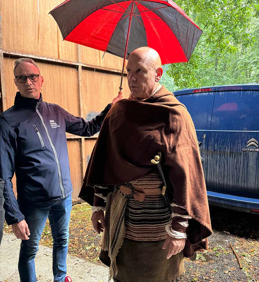 Jedd the slayer trying to stay dry on the set of The Questing beast